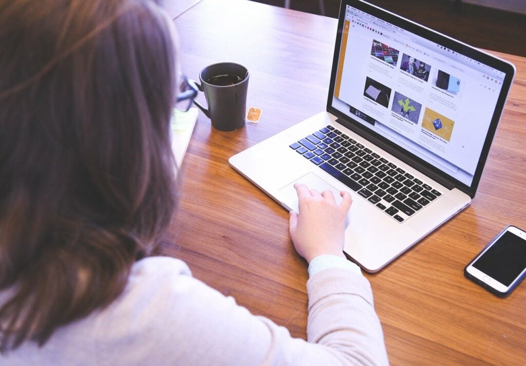 Woman researching how to register a trademark in Guatemala